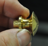 Turned brass