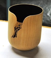 Turned and pierced cup
