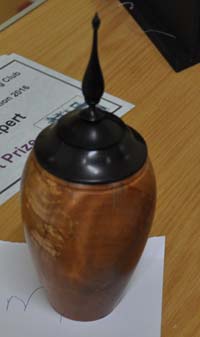 Turned wooden vase with finial