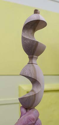 Off centre turned candlestick