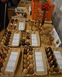 Turned wooden eggs and chestnut vases