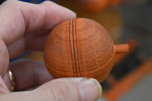 Cricket ball with peg