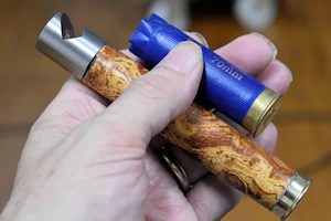 Cartridge bottle opener