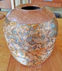 Hollow form withgold leaf
